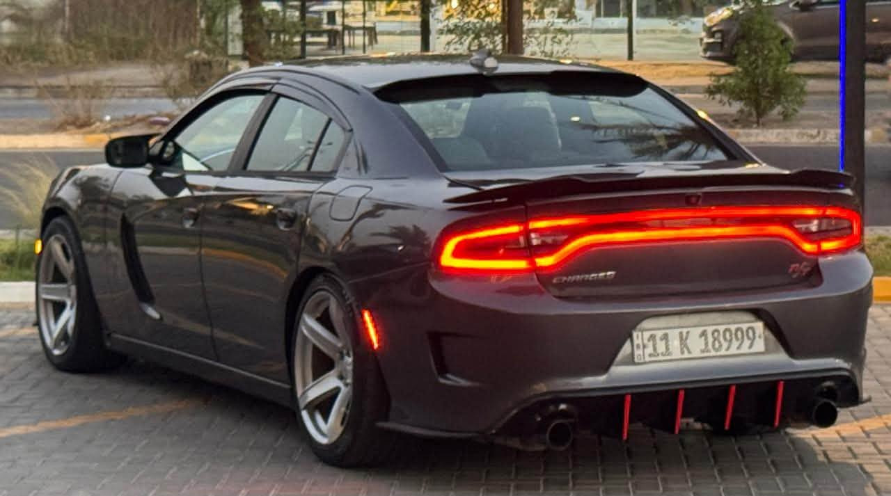 Dodge Charger Hemi R/T  2016 دوج جارجر هيمي
ضررها جانبي بسيط. صبغ ٣ قطع وقطعتين تبديل
لغد شاصي مكفول 
محرك و الكير مكفول شرط الفحص
عليها منظومة غاز و بيها كارت 
المواصفات  : 
- محرك 5,700
- شاشة وسائط كبيرة 
- كاميرا خلفية دوارة
- كشنات تدفئه
- شفتات ستيرن تبترونك 
- مري قلاب + حساس للضوء العالي 
- بصمة تشغيل + بصمة ابواب
- تشغيل عن بعد
- منظومة زينون 
- مود Sport
- ويل حجم 20 و تخم تاير جديد
عليها كت كامل Srt بنيد و دعاميات  
جاهزه السياره متحتاج اي صرف
السعر 169 ورقه بيها مجال بسيط
عنواني بغداد / الكرخ 
***********
