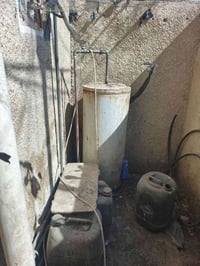 سخان واثنين تانكيات  4 ابواب خشب  واثنين غربيات  ومغسله مكاني بغداد حي...