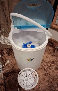 غسالة ملابس • مستعملة • قليلة الاستخدام