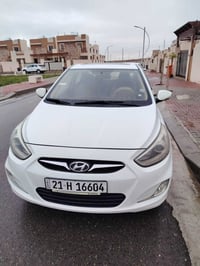 اكسنت • ٢٠١٤ • شاشة وكاميرا