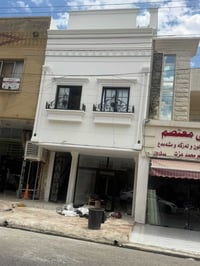 بناية تجارية • ١٠٠م • محل كبير