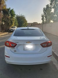 كروز  ٢٠١٨ لون ابيض رقم نينوى محرك وكير شرط ..التقرير  مرفق مع الصور، ...