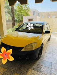 سيارة لانسر 2010 مكينه 1600 كير عادي كامله من كلشي كير مكينه صدر فقط ب...