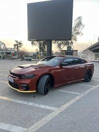 جارجر sxt 2022 لون مميز مشمشي 🧡 محدث للجمالية والغراض ألقديمة موجودة ك...