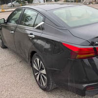 نيسان التيما  مكلف بالنشر  موديل2022 وارد امريكي  ضرر بابين وجاملغ خلف...