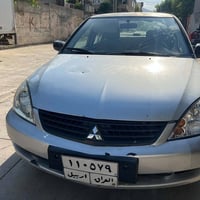 لانسر 2008 • جير عادي • مكيف