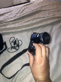 كامره نيكون بسعر مناسب جدا مكاني الدوره 100 الف فقط 07881146712