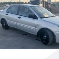 ميتيبوشي لانسر اوتماتيك موديل 2003 مصبوغه عام جماليه بيها طخه بلصندوك ...
