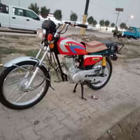 دراجة نارية • نمرة 25 • أوراق سكنر