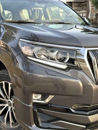 برادو 2023 VX باب اول فول مواصفات ساز  ماشية 50 الف رقم بغداد شبه مميز...