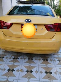 كيا اوبتيما موديل 2009 رقمها ديالى وارد امريكي ضررها جاملغ خلفي مصلح ن...