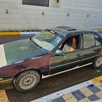 اوميغا ١٩٩٢ • زيتوني • ٢٠٠٠ كير عادي