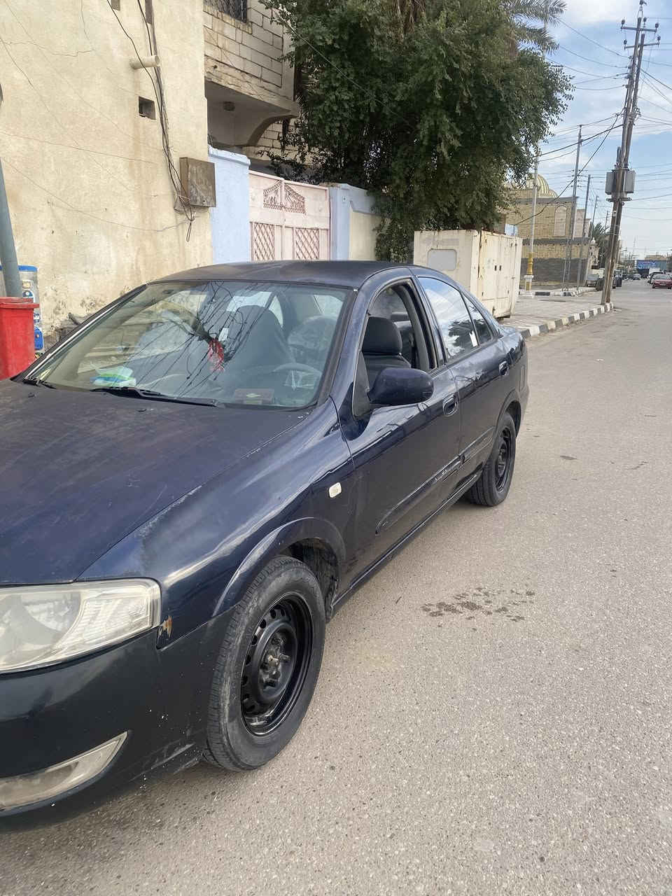 عندي نيسان صني 2012 كوري 1800السيارة جارده بس هيَ نظيفه من ناحيه المشي والمكينه وكهربائياتها وعلى وضع البلاد كل شي ممفتوح بيهه وماشيه 135 الف وتكدر تفحص الكير والمكينه حتى تتأكد من مشيهه واليسأل عالضربه مال البنيد اني ضربته وموضح بالفيديوا انو ضربتهه بالبدنه حتى للراديتر مواصله وحتى دواخل ماواصله التبريد ثلج والسياره تاخذ بيهه تراي وين ماتريد رايدهها 85ورقه وبيهه مجال***********
