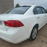 اوبتيما • ٢٠٠٩ • مكينة ٢٠٠٠