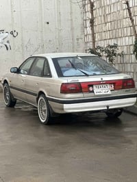 مازدا ٨ • جير عادي • فولي ابيض