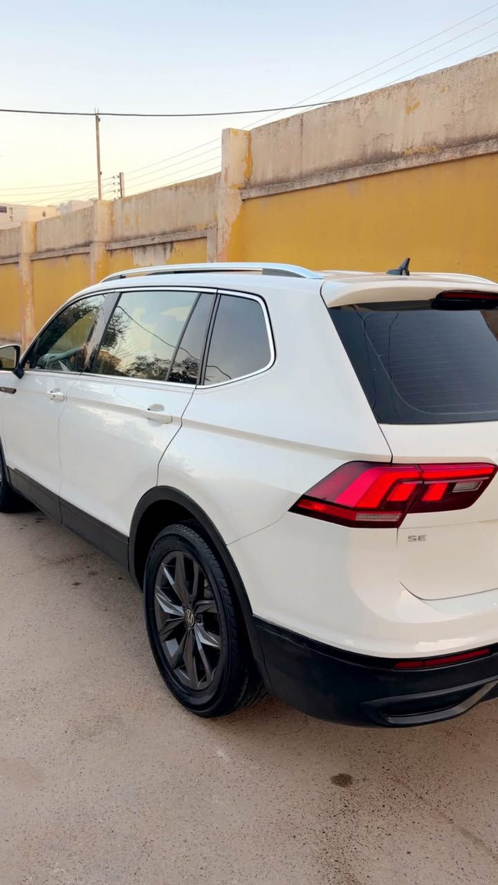Volkswagen Tiguan 2022
‎فولكسفاغن تيكوان  2022 (بانوراما7 مقاعد)

‎موديل :2022
‎الصنف :SE
‎سعة المحرك :  4 سلندر cc turbo 
‎اللون الخارجي : أبيض 
                                                 اللون الداخلي جلدقيسي
‎قراءة العداد : 70 ميل 
‎المواصفات 
‎- بانوراما.
‎- 7 راكب
‎- شاشه كبيره
‎-  تبريد خلفي وامامي( 8 مخارج للتبريد) 
‎- نظام carplay 
‎-  شاشة وسطية
‎-  نظام النقطة العمياء 
‎-  هاند بريك بصمة + اوتوو هولد
‎- نظام توقف تلقائي عند الرجوع
‎ -  كاميرة خلفية بدقة عالية 
‎ -  نوع المقاعد: كهربائي - جلد - تدفئة )
‎-  المصابيح:  زينون - إضاءة ليد- ليزر
‎- بجم امامي كبس بوينت صبغ و جملغ و باب سايق  بدون داخل ايرباگ بس دوگمه
*********** دهوك, العراق

