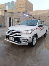 هيلوكس ناصي مديل 2021  شركة SAS  مكفول  ماشية 180 الف  بسمي كذلك مصفرة...