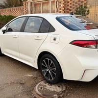 كورلا هايبرد 2024  ماشيه 30 الف   مكفوله سعر 145  (07705554465