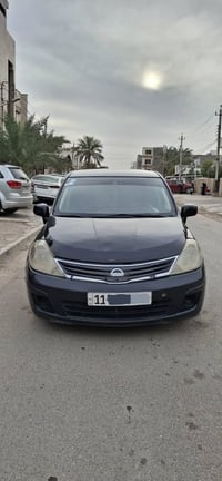 نيسان فيرسا موديل 2008  رقم بغداد دولي بأسمي  كير محرك نضيفات  صدر نظي...