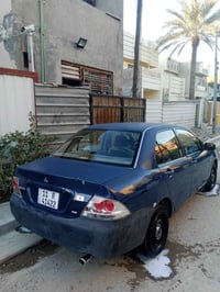 لانسر بومه • ٢٠٠٤ • مكينه وكير مكفولات