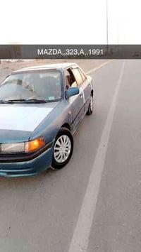 مازدا ٣٢٣ • ١٩٩١ • باور