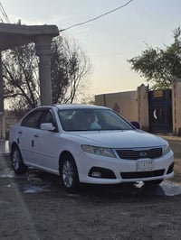 اوبتيما • ٢٠١٠ • مكينة ٢٤٠٠