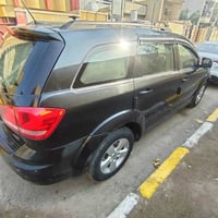 دوج جورني ٢٠١١ محرك ٣٦٠٠ لون اسود رقم  بغداد بسمي ٧ راكب ٣ قطع تبريد م...