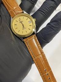 تيسوت PR50 • سويسري • قطر ٣٤مم