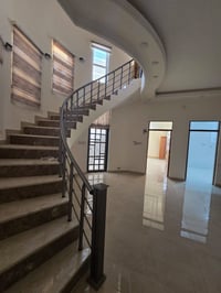 حي الإسكان • غرفتين نوم • قرب مدرسة السرور