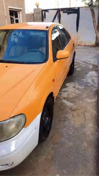 نيسان سني 2009 گير و مكينه مكفول  تخم تاير صدر  مكاني بغداد  شرط ‭0781...