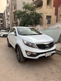 سياره سبورتج 14رقم بغداد خليجي مكفول من صبغ والضربه سياره نضيف وكامله ...