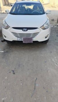 توكسان • ٢٠١١ • ضربه باب السايق