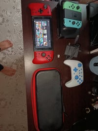 نينتندو سويج وياها ٢ ميموري واحد تيرا و نص بيها ٥٣ لعبة وميموري ثاني ب...