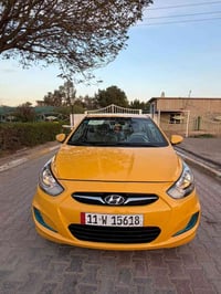 هونداي اكسنت صفرة 2014 خليجي  السيارة بيهة جاملغ خلفي وباب ودوسات صبغ ...