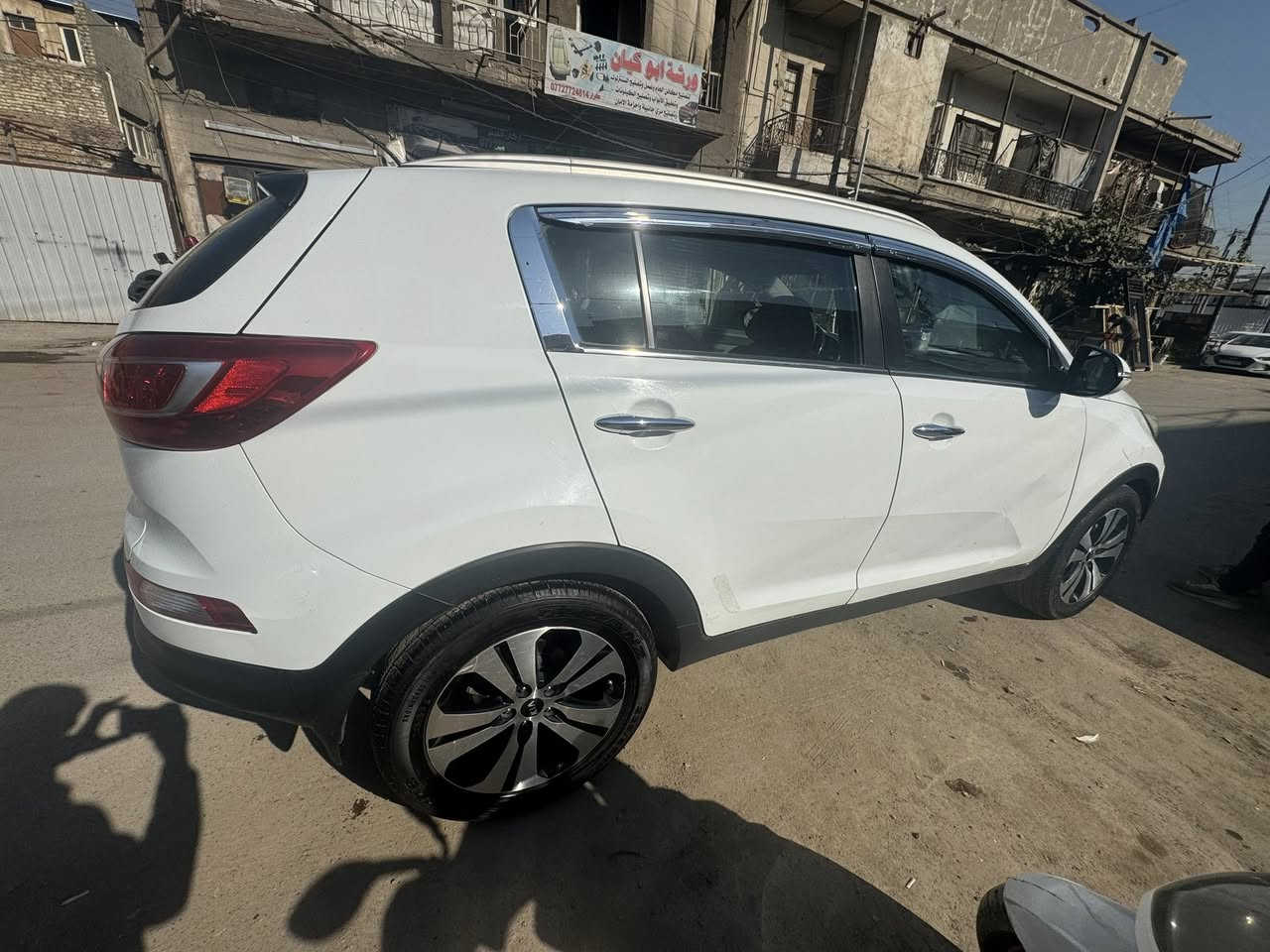 سبورتج 2014 خليجي 
بيهة بنيد مصبوغ نصة وبيهة جاملغ مبدل والاصلي جاملغ موجود بي طخة خفيفة 
وبيهة بارد مثل مموضح بالصور 
سيارة تخم تاير
 ماشية 170 
مري شفط محرك 2000 دوش
للاستفسار ***********
بغداد الاعظمية 
السعر 143 وبيهة مجال
