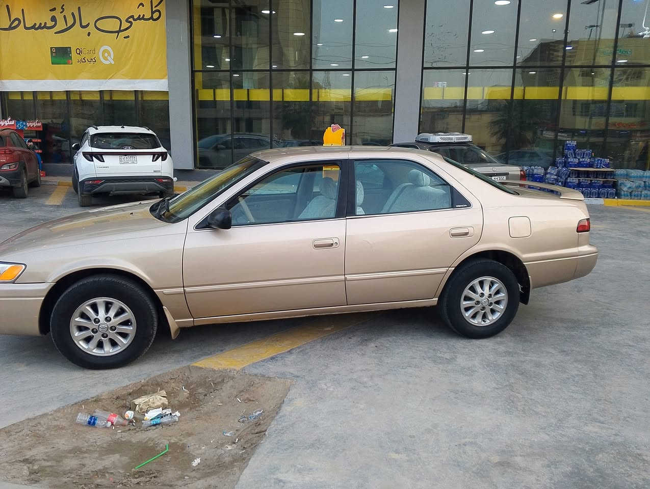 السلام عليكم موديل 97 كامري وارد امريكي سياره جديده وخير من الله رقم بغداد مكان  السياره البياع السعر 80 رقم ***********
