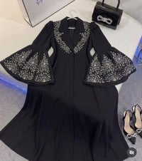خليجي • ملابس