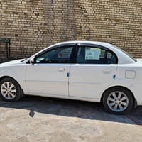 كيا ريو خليجي.مكينة. گير شرط. تبريد حداديه كله جاهز. رقم لل31. بسمي. ض...
