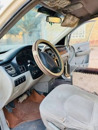 سياره هونداي اترانجيت 2006 رقم بغداد بسمي جاهزه مكينه وكير وحداديه خير...