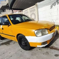 سياره اكسنت فيرنا موديل 2000 رقم بغداد للبيع   نقابه مصفر  كهربائيات ك...