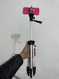 ستاند تصوير • حافظات ايفون 14 • توصيل