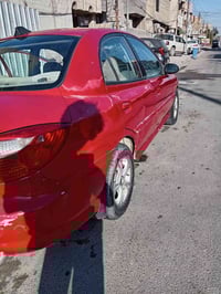 كيا ريو • ٢٠٠١ • بغداد الشعب