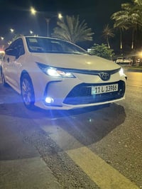 تويوتا كورلا 2025 هايبرد ماشية 31الاف كيلو و رقم   بغداد بسمي تحويل مب...