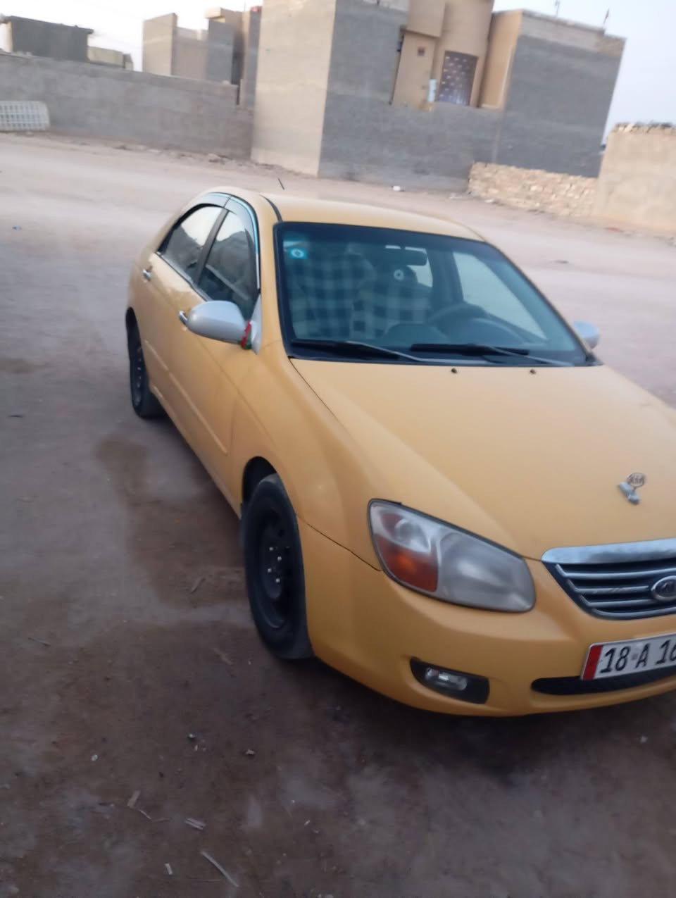 سلام عليكم سبكترا 2009 ليبل واحد مصفره هيئه وغرامات  بيه ضربه في جاملق بجهت عكس السائق مكانه كربلاء رقم ***********
