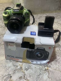 للبيع كمره كانون D400 كمل ملحقاته السعر 300 وبيه مجال 07733171474