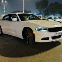 جارجر 2022 لون ابيض وارد امريكي حادث جاملغ مبدل وباب مصلح نفسه بدون اي...