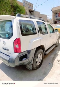 سيارة نيسان 2008 عنوان بغداد الجديدة سعر 65وبيها مجال رقم  07722336510