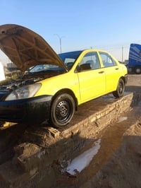 لانسر • ٢٠١٠ • مكينة ٢٠٠٠