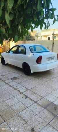 دايو لانوس 2001 رقم أربيل سنويه لحد 2028 كير عادي  محرك 18قايش عريض تب...