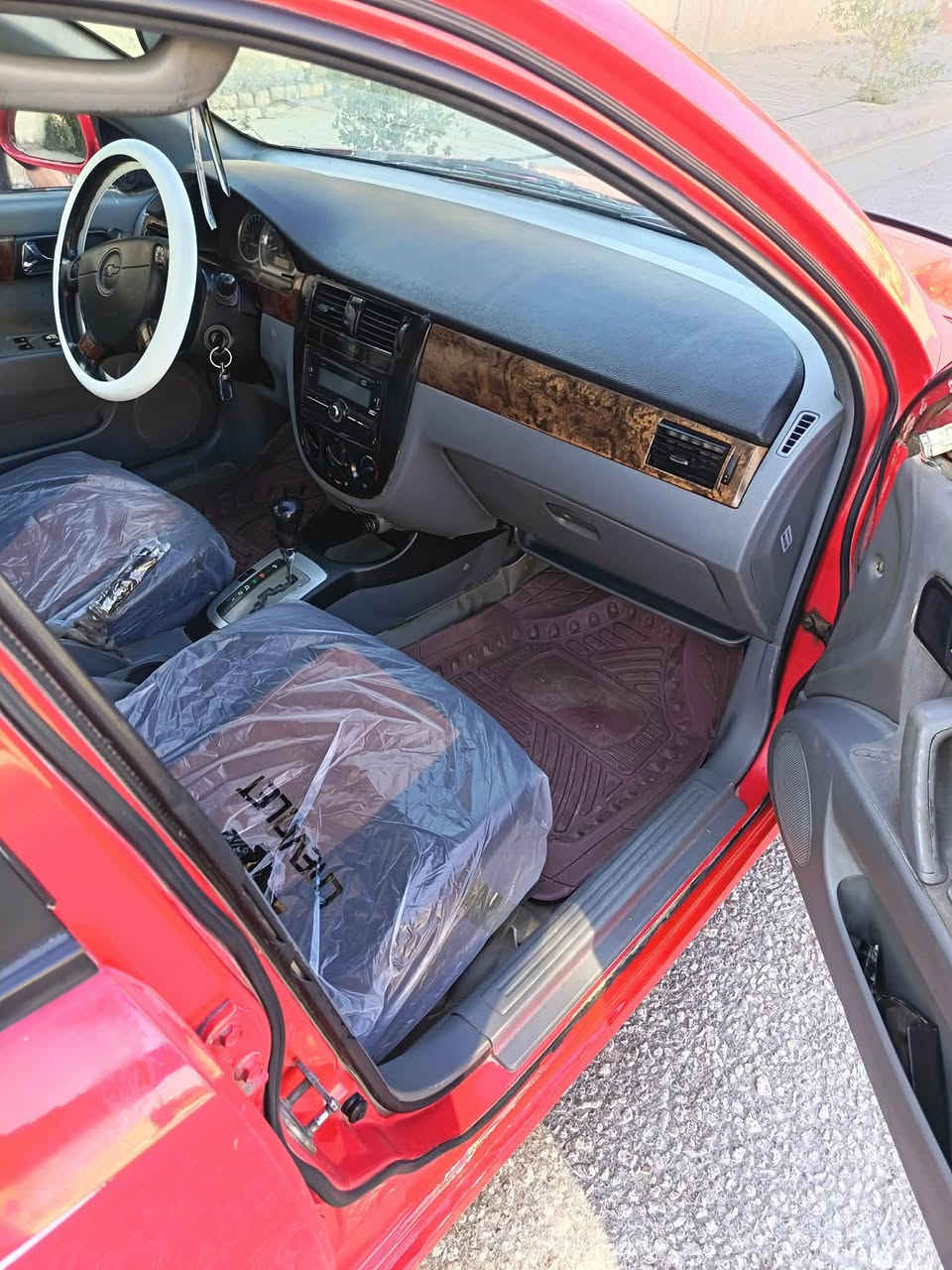 السلام عليكم اوبتراه للبيع موديل 2006رقم كربلاء سنويه جديد مكينه وكير اوتو وحداديه تبريد  كله تمام مكفولة من ظربه صبغ بيها قطعتين سعرها 60ورقه مكاني كربلاء رقم التليفون ***********
